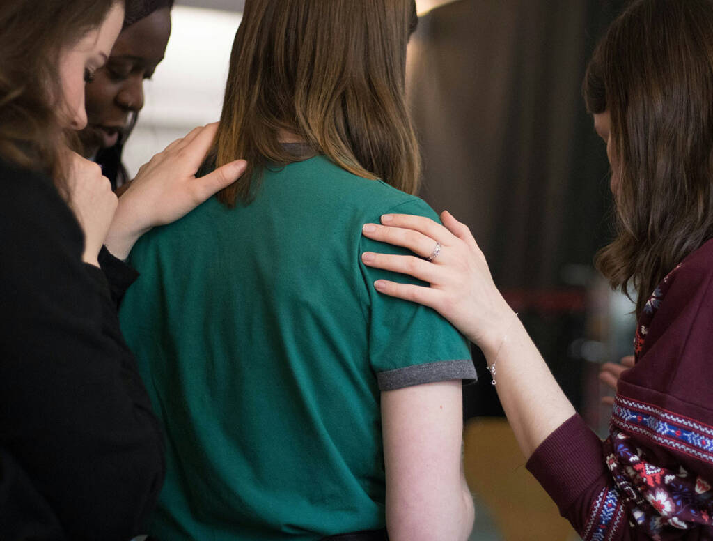 A group of women in a workshop setting